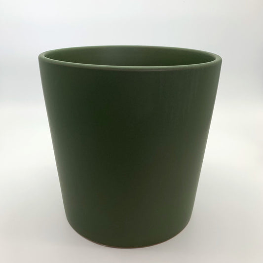 The Glow Getter avocado green glazed ceramic planter with a smooth glossy finish, photographed on a clean white background.