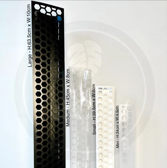 Set of vertical wine racks with different sizes displayed against a white background.