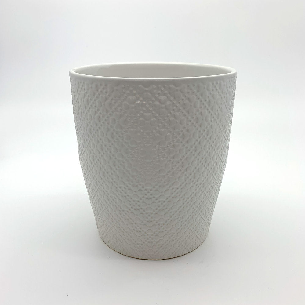 Textured white indoor planter with a rounded shape, photographed on a clean white background.
