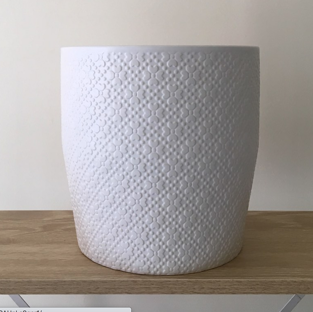 Large textured white ceramic planter from Potted & Co., displayed on a wooden surface.