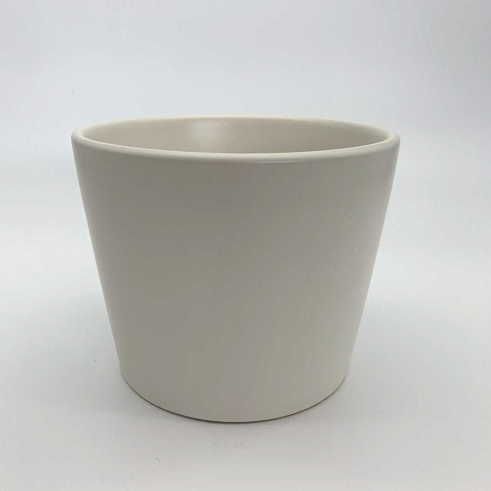 The Glow Getter white glazed ceramic planter with a glossy finish, photographed against a clean white background.