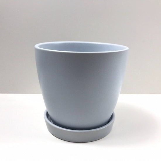 The Good Influence duck egg blue ceramic pot-and-saucer set photographed on a clean white background.