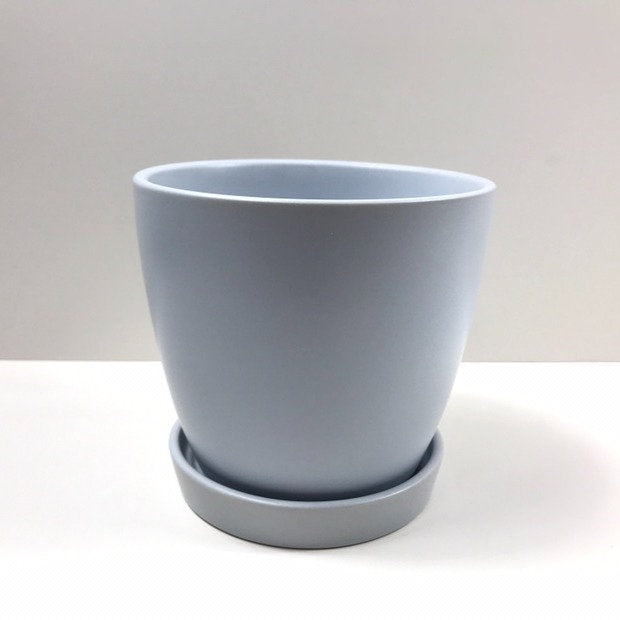 The Good Influence duck egg blue ceramic pot-and-saucer set photographed on a clean white background.