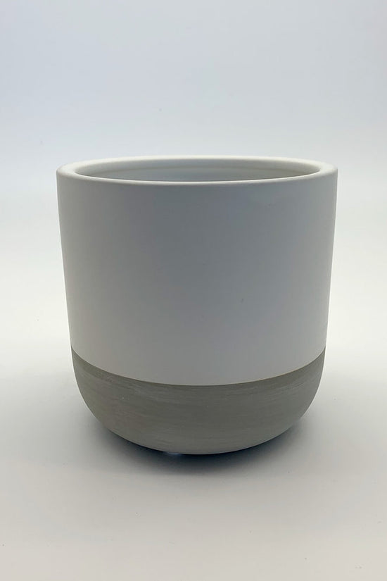 The Room Refresh planter featuring a white matte body and grey base, photographed on a clean white background.
