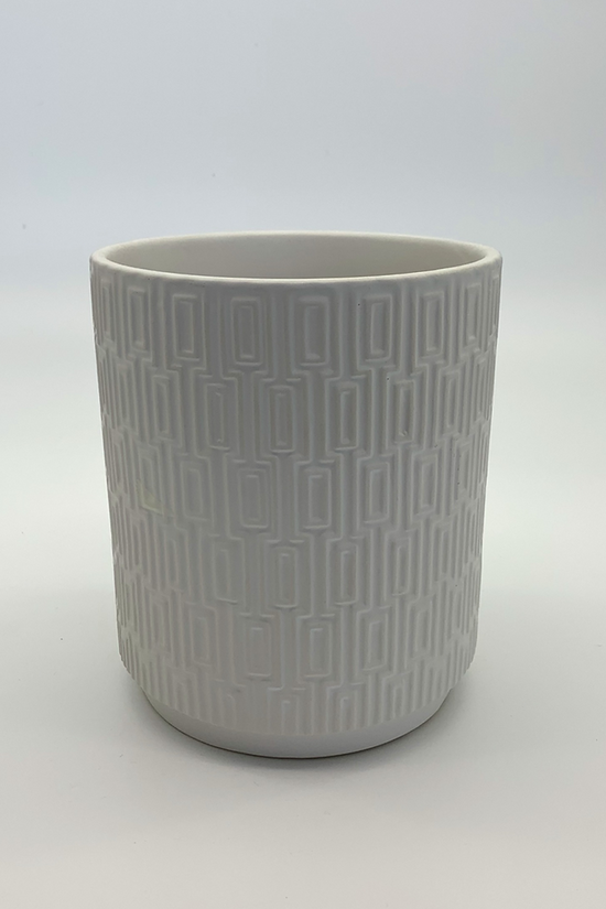 The Side Table Star white geometric planter photographed front-on against a plain white background.