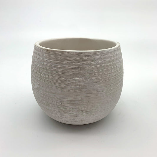 The Sidekick white round planter with a soft textured finish photographed on a clean white background.