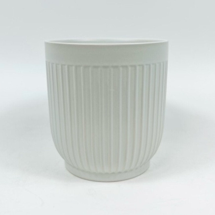 The Soft Shape planter in matte white with soft vertical ribbing photographed against a plain white background.