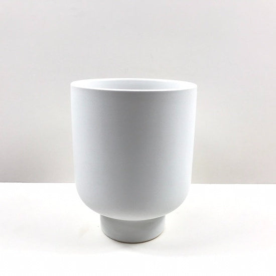 The Sunday Pot in matte white with smooth curves and elevated base photographed on a clean white surface.