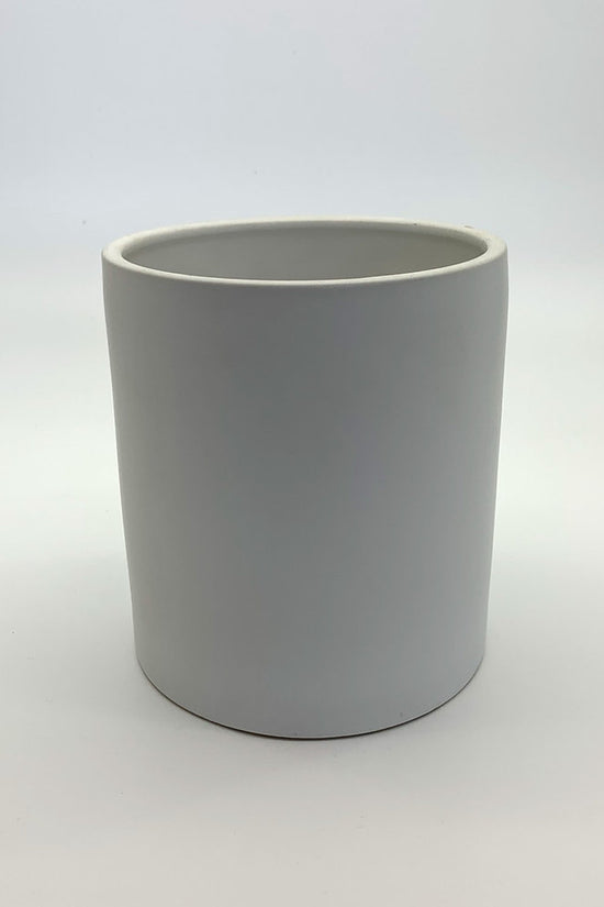 The Ultimate Roommate planter in matte white with a smooth cylindrical shape photographed on a clean white background.