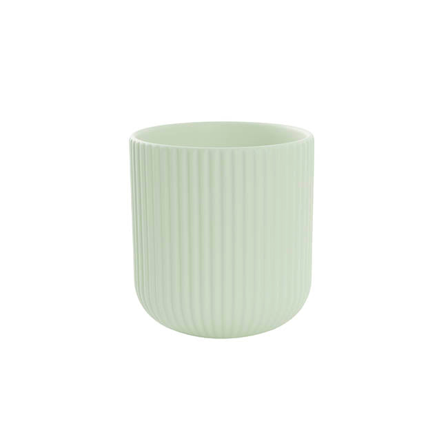 The Effortless Fit soft sage ribbed ceramic planter photographed on a clean white backdrop.