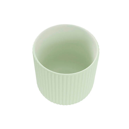 The Effortless Fit pale green ribbed planter with a matte finish photographed on a neutral white background.