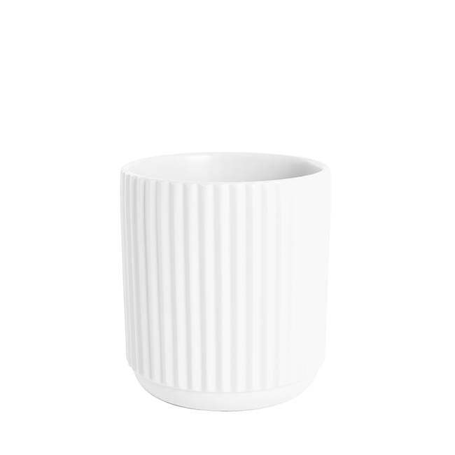 The Everyday Hero matte ceramic planter in White, 14cm size.