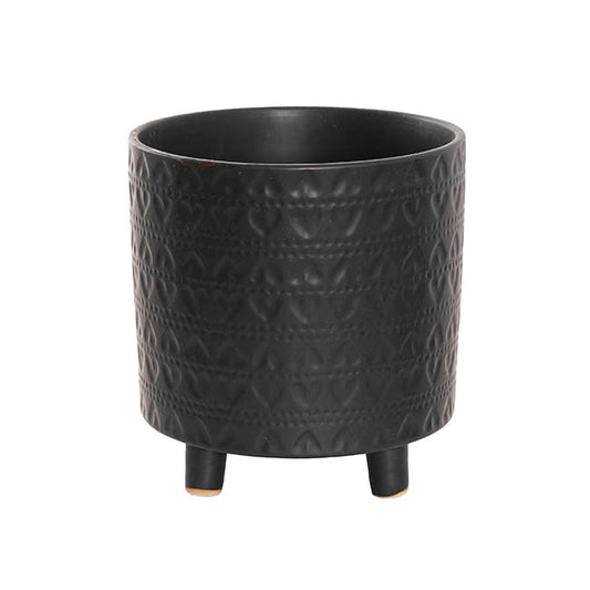 The Perfect Pair large matte black planter features subtle leaf-patterned texture and short, rounded feet.