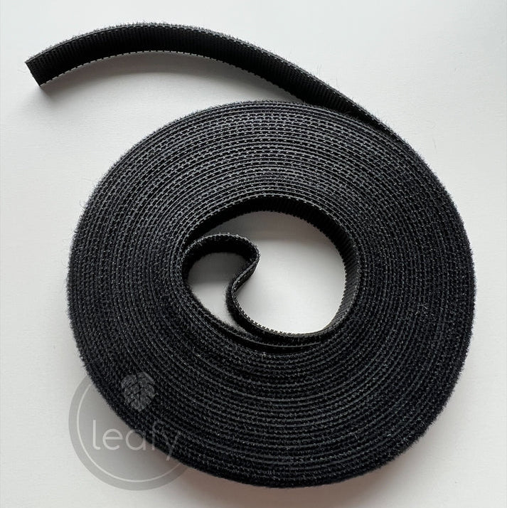 Black velcro strip on a white background
