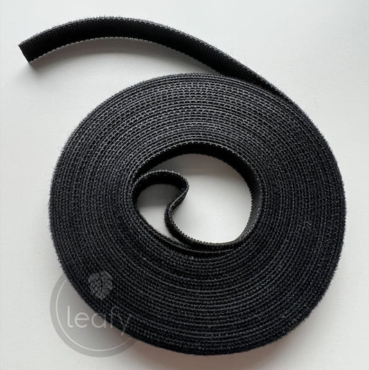 Black velcro strip on a white background