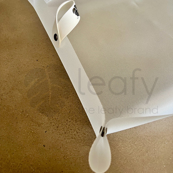 White mesh screen with attached frame on a beige background, featuring the 'leafy' brand.