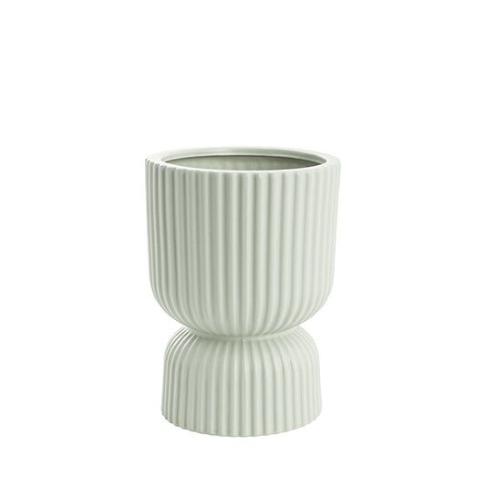 The Perfect Fit sage sculptural planter with an egg-cup silhouette and ribbed texture, photographed on a clean white background.