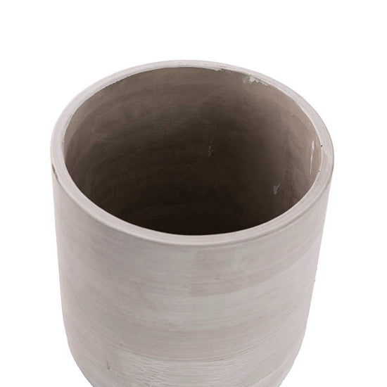 Angled view of The Quiet Achiever grey cement planter showing its subtle texture and thick-walled build.